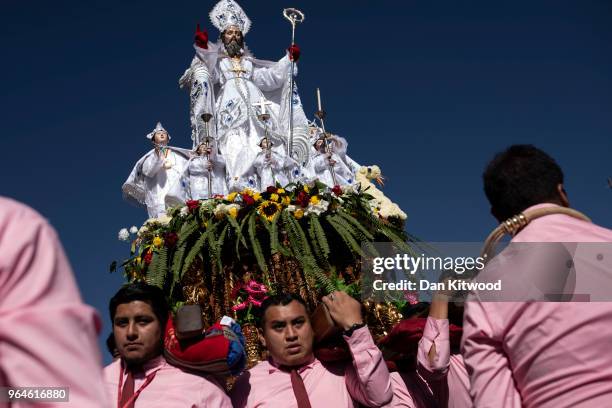 Giants 'Saints' are carried and moved in procession from their original parishes to the Cathedral of Cusco in Plaza De Armas as Corpus Christi is...