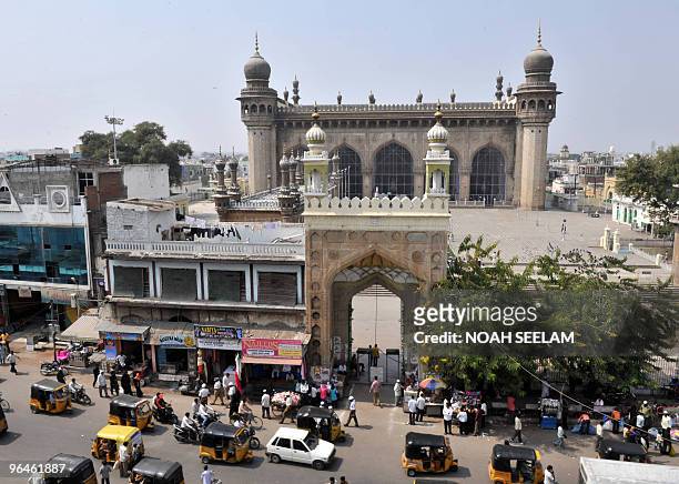 Traffic is seen in front of the historic Mecca Masjid in Hyderabad on February 6, 2010. The mosque was built during the reign of Sultan Mohammad...