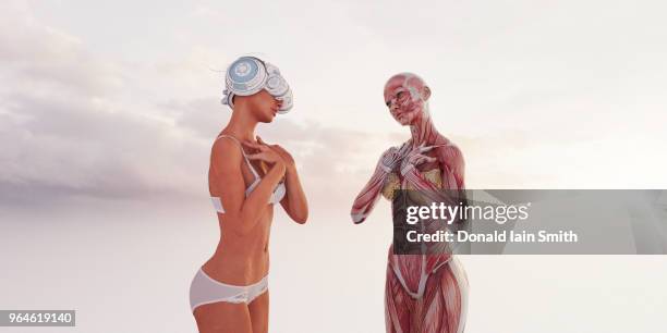 woman wearing vr headset sees her virtual anatomical body model - anatomical model stock pictures, royalty-free photos & images