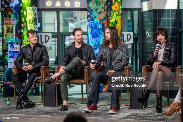 Arejay Hale, Joe Hottinger, Josh Smith and Lzzy Hale of Halestorm discuss "Vicious" with the Build Series at Build Studio on May 31, 2018 in New York...