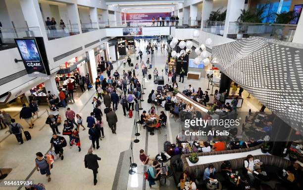 Passengers travel through the current LAX Delta Terminal 2 on May 31, 2018 following a press conference to announce that Delta Air Lines and Los...