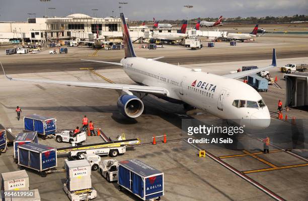Delta flight arrives at LAX Terminal 2 on May 31, 2018 at the beginning of a press conference to announce that Delta Air Lines and Los Angeles World...