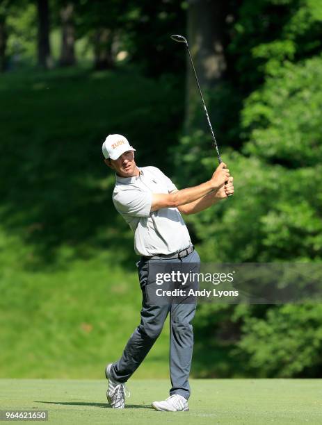 Lucas Glover of the United States hits his second shot on the 15th hole during the first round of The Memorial Tournament Presented by Nationwide at...