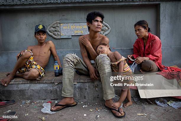 Chamaroun lives on the streets with his wife and child, he is addicted to sniffing shoe glue since 1997, February 6, 2010 in Phnom Penh, Cambodia. He...