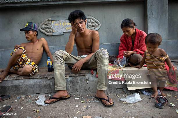 Chamaroun lives on the streets with his wife and child, he is addicted to sniffing shoe glue since 1997, February 6, 2010 in Phnom Penh, Cambodia. He...