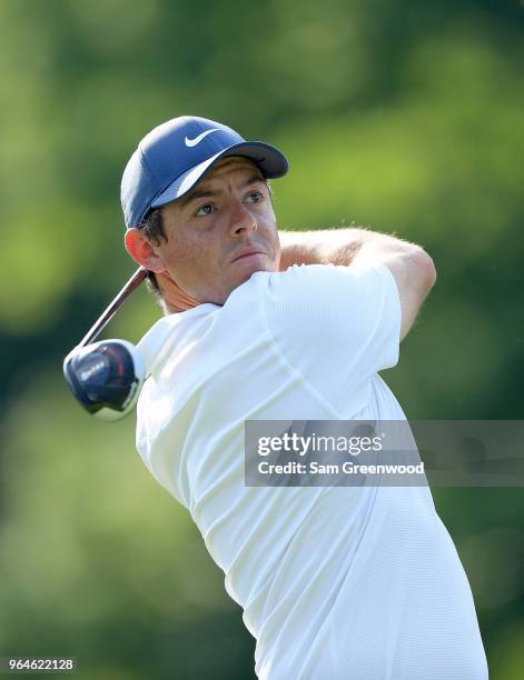 Rory McIlroy of Northern Ireland watches his tee shot on the 18th hole during the first round of The Memorial Tournament Presented by Nationwide at...