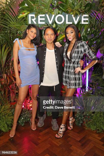 Chanel Iman, Michael Mente and Winnie Harlow attend the REVOLVE 'LA Party In London' hosted by Winnie Harlow at Hotel Cafe Royal on May 31, 2018 in...
