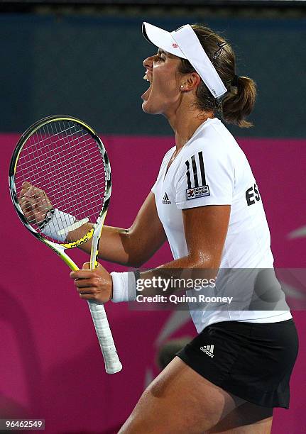 Anabel Medina-Garrigues of Spain celebrates winning her singles match against Casey Dellacqua of Australia during the 2010 Fed Cup World Group II tie...