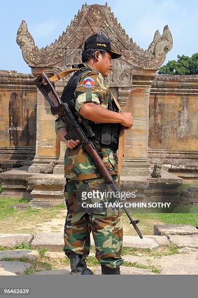 Cambodian sniper of the Prime Minister's Bodyguard Unit stands guard during a visit by Cambodian President Hun Sen to the Preah Vihear temple in...