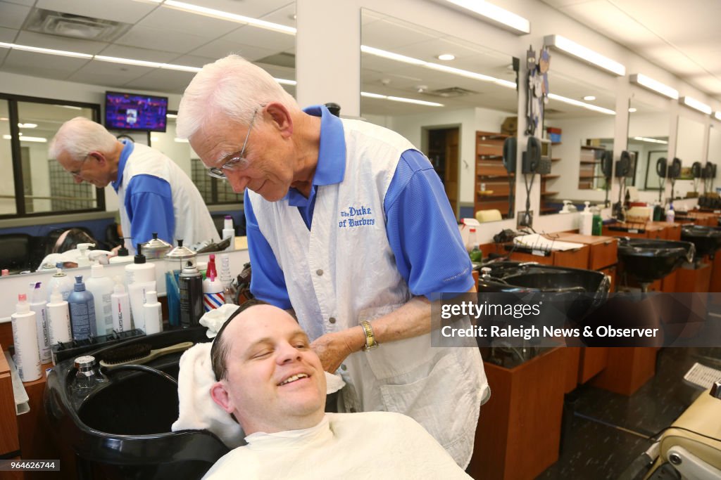 This barber outlasted the flattop and the mullet. At 85, his clippers are still buzzing