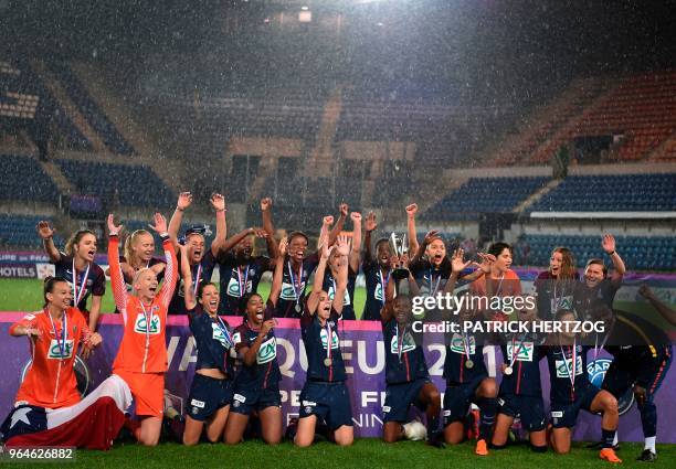 Paris Saint-Germain's players lift the trophee at the end of the French Cup women final match between Paris Saint-Germain and Olympique Lyonnais at...