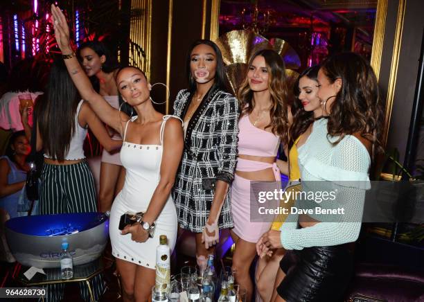 Draya Michele, Winnie Harlow, Madison Grace, Victoria Justice and Julissa Bermudez attend the REVOLVE 'LA Party In London' hosted by Winnie Harlow at...