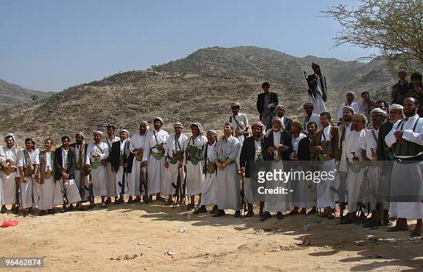 Pro-government tribal militants listen to the speech of Yemeni Brigadier General Ali Mohsen al-Ahmar, commander of the Yemeni army in the...