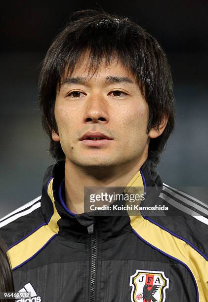 Keiji Tamada of Japan looks on prior to playing the East Asian Football Championship 2010 match between Japan and China at Ajinomoto Stadium on...