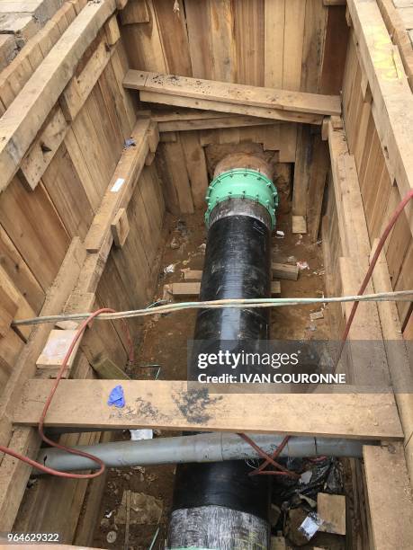 New gas line is seen at a construction site May 30, 2018 in Northern Philadelphia as Gas Works workers replace cast iron gas mains with stainless...