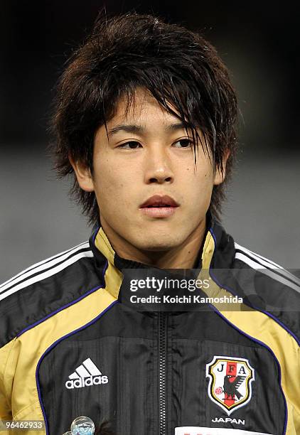 Atsuto Uchida of Japan looks on prior to playing the East Asian Football Championship 2010 match between Japan and China at Ajinomoto Stadium on...