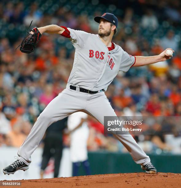 Drew Pomeranz of the Boston Red Sox pitches in the first inning against the Houston Astros at Minute Maid Park on May 31, 2018 in Houston, Texas.