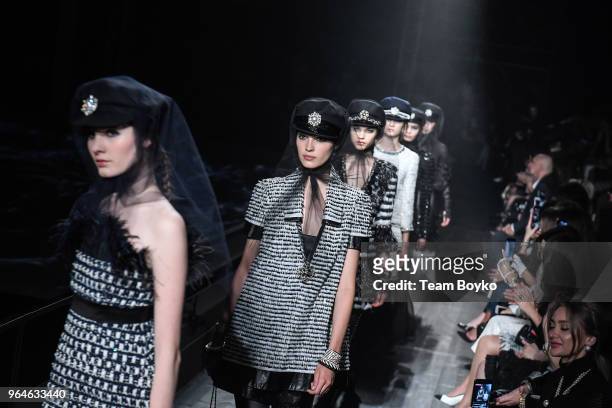 Models walk the runway during the Chanel Replica Show In Moscow "Metiers D'Art Paris - Hamburg 2017-18" on May 31, 2018 in Moscow, Russia.