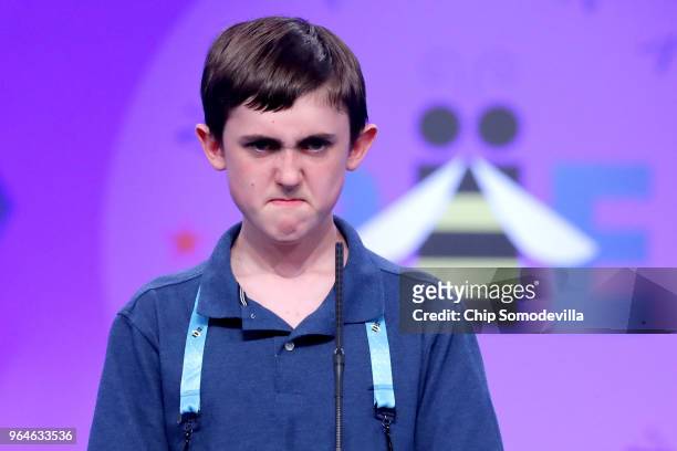 Paul Hamrick successfully spells the word 'binnacle' during the final rounds of the 91st Scripps National Spelling Bee at the Gaylord National Resort...