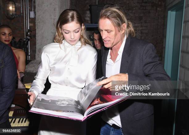 Gigi Hadid and Russell James attend the U.S. Book launch of "Backstage Secrets By Russell James" hosted by Russell James and Ed Razek on May 31, 2018...