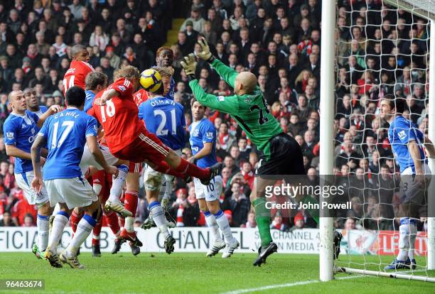 Dirk Kuyt of Liverpool scores a header for Liverpool during the Barclays Premier League match between Liverpool and Everton at Anfield on February 6,...