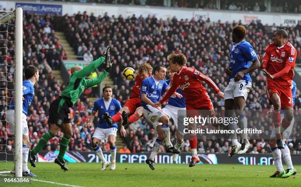 Dirk Kuyt of Liverpool scores the opening goal during the Barclays Premier League match between Liverpool and Everton at Anfield on February 6, 2010...