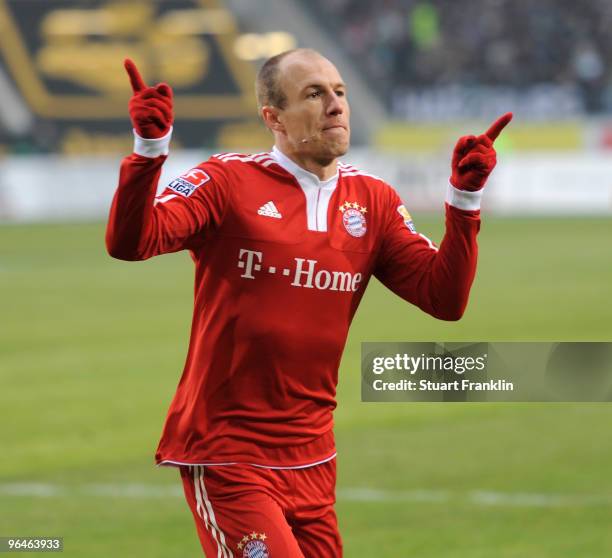 Arjen Robben of Muenchen celebrates scoring the first goal during the Bundesliga match between Vfl Wolfsburg and FC Bayern Muenchen at Volkswagen...