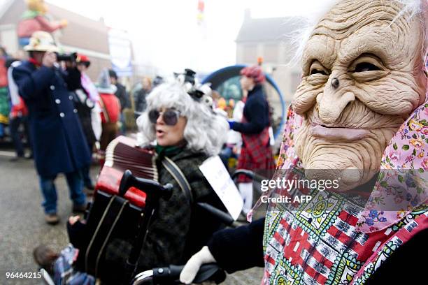 Parade goers watch as a Dutch carnival parade proceeds through Wouwse Plantage, in Brabant, on February 6, 2010. Dutch Carnival is mostly celebrated...