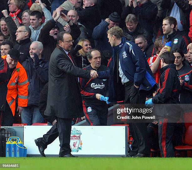 Rafa Benitez manager of Liverpool and David Moyes manager of Everton shake hands at the the end of the Barclays Premier League match between...