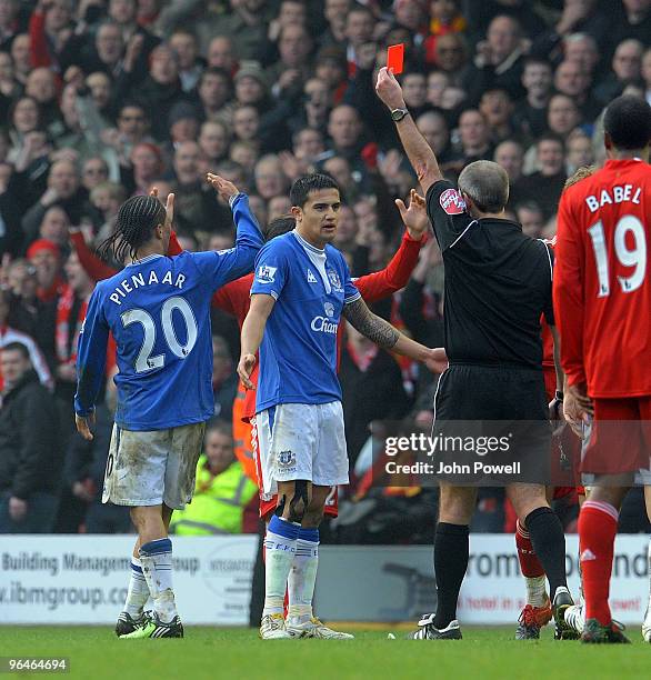 Steven Pienaar of Everton gets a red card during the Barclays Premier League match between Liverpool and Everton at Anfield on February 6, 2010 in...