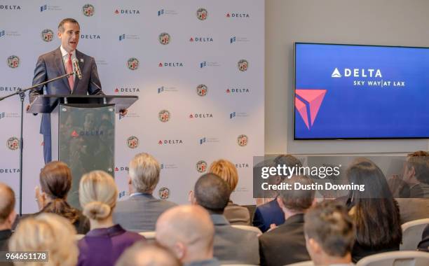 Los Angeles Mayor Eric Garcetti speaks during the press conference to launch the Delta Sky Way at LAX project at Los Angeles International Airport on...