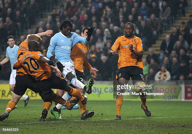 Emmanuel Adebayor of Manchester City scores a goal during the Barclays Premier League match between Hull City and Manchester City at the KC Stadium...