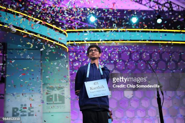 Confetti falls from the ceiling after Karthik Nemmani correctly spelled the word 'koinonia' to win the 91st Scripps National Spelling Bee at the...