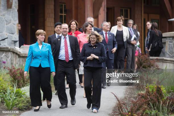 Marie-Claude Bibeau, Canada's minister of international development and La Francophonie, front left, David Moore, acting deputy administrator of U.S....