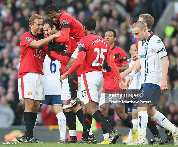 Dimitar Berbatov of Manchester United celebrates scoring their fourth goal during the FA Barclays Premier League match between Manchester United and...