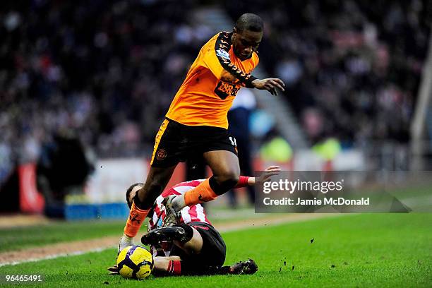 Charles N'Zogbia of Wigan battles with George McCartney of Sunderland during the Barclays Premier League match between Sunderland and Wigan Athletic...