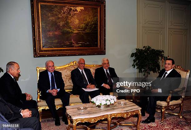 In this handout image provided by the Palestinian Press Office Palestinian Authority President Mahmoud Abbas meets with Egyptian President Hosni...