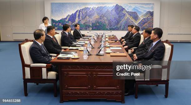 South Korean Unification Minister Cho Myoung-gyon talks with the head of North Korean delegation Ri Son-Gwon during their meeting on June 1, 2018 in...