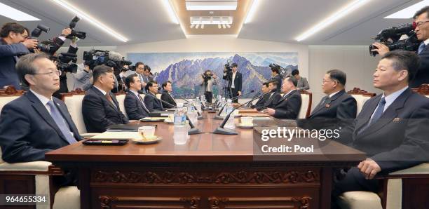 South Korean Unification Minister Cho Myoung-gyon talks with the head of North Korean delegation Ri Son-Gwon during their meeting on June 1, 2018 in...