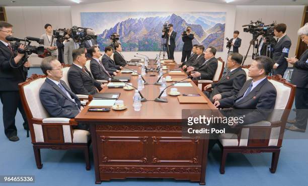 South Korean Unification Minister Cho Myoung-gyon talks with the head of North Korean delegation Ri Son-Gwon during their meeting on June 1, 2018 in...