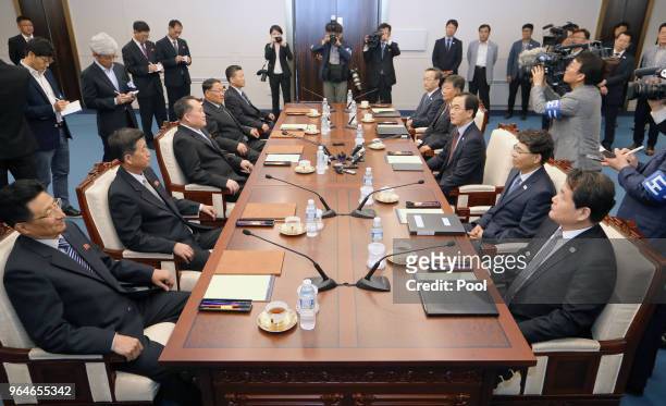South Korean Unification Minister Cho Myoung-gyon talks with the head of North Korean delegation Ri Son-Gwon during their meeting on June 1, 2018 in...
