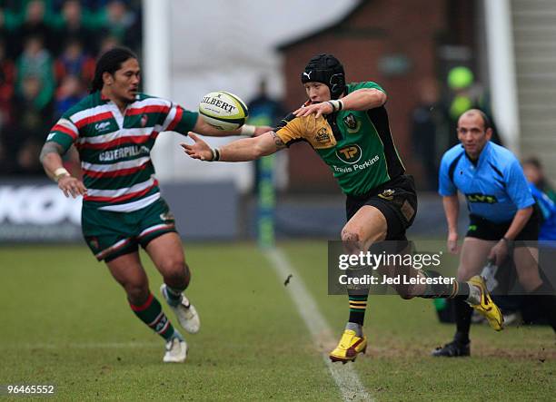 Alesana Tuilagi of Leicester Tigers shadows Bruce Reihana of Northampton Saints, on his 200th club appearance, as he passes from touch to himself...