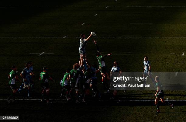 Sam Warburton of Cardiff Blues and Lou Reed of Llanelli Scarlets jump for the ball in a line out during the LV= Anglo Welsh Cup match between...