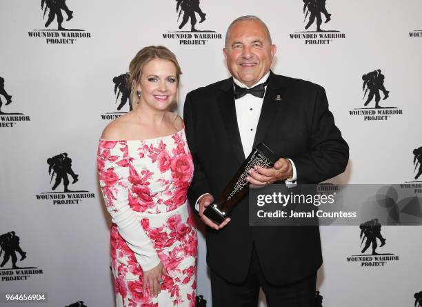 Melissa Joan Hart presents the Service Award to Tom Cocchiarella during the Wounded Warrior Project Courage Awards & Benefit Dinner on May 31, 2018...