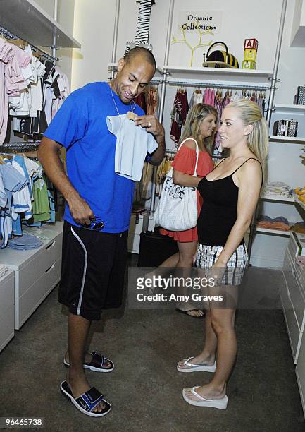 Philadelphia Eagles wide receiver Hank Baskett and Kendra Wilkinson attend the Bel Bambini VIP Store reception at Bel-Bambini on July 17, 2009 in...