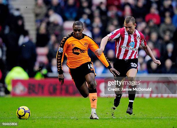 Charles N'Zogbia of Wigan battles with Lee Cattermole of Sunderland during the Barclays Premier League match between Sunderland and Wigan Athletic at...