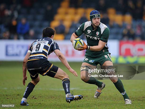 Kieran Roche of Irish takes on Jonny Arr of Worcester during the LV= Cup match between Worcester Warriors and London Irish at Sixways Stadium on...