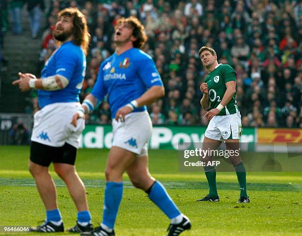 Ireland's fly half Ronan O'Gara watches his penalty kick during the Six Nations rugby union match between Ireland and Italy at Croke Park in Dublin,...