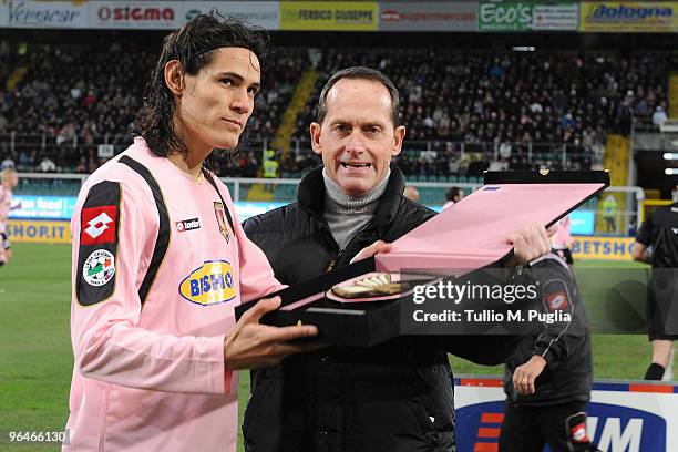 Edinson Cavani of Palermo receives a celebrating award from vice-president Guglielmo Micciche before the Serie A match between Palermo and Parma at...