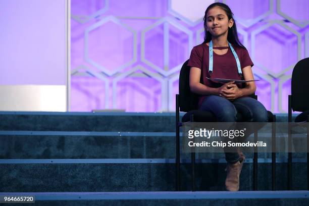 Naysa Modi grimaces after misspelling the word 'Bewusstseinslage' in the final round of the 91st Scripps National Spelling Bee at the Gaylord...